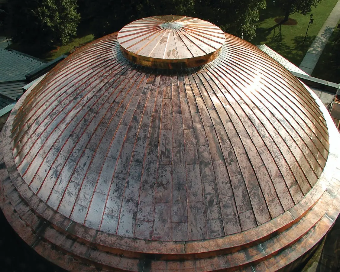 Craftsman Roofing crew installing a new roof in Olean